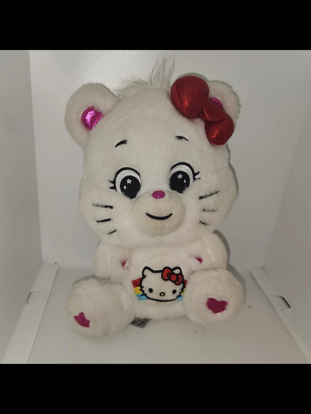Hello Kitty Loves Cheer Bear from the Sanrio x Care Bears crossover collection
